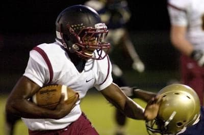 Greg Stroman playing high school football
